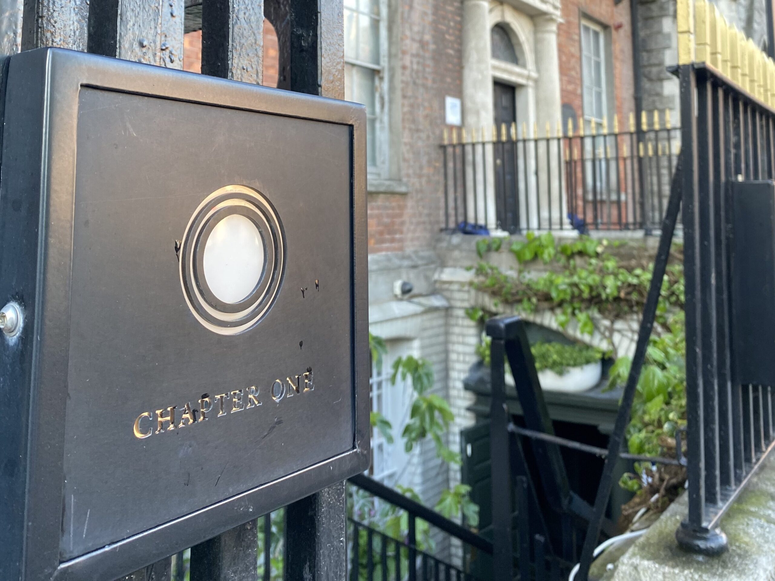 A sign for a restaurant outside.